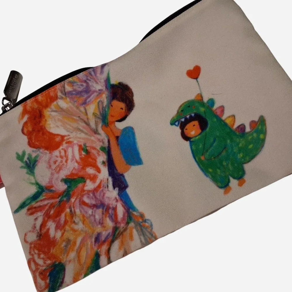 Womens Phillipines canvas pouch with graphic of a girl with a green dinosaur